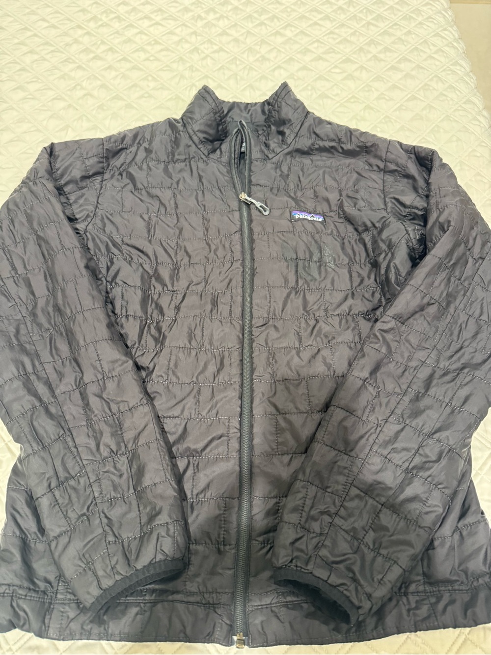 Patagonia Black Quilted Puffer Jacket- medium- good condition- hole on shoulder